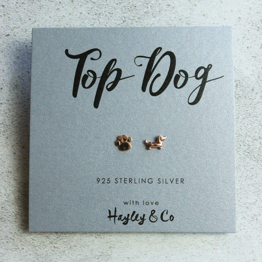 Rose gold dog paw earrings top